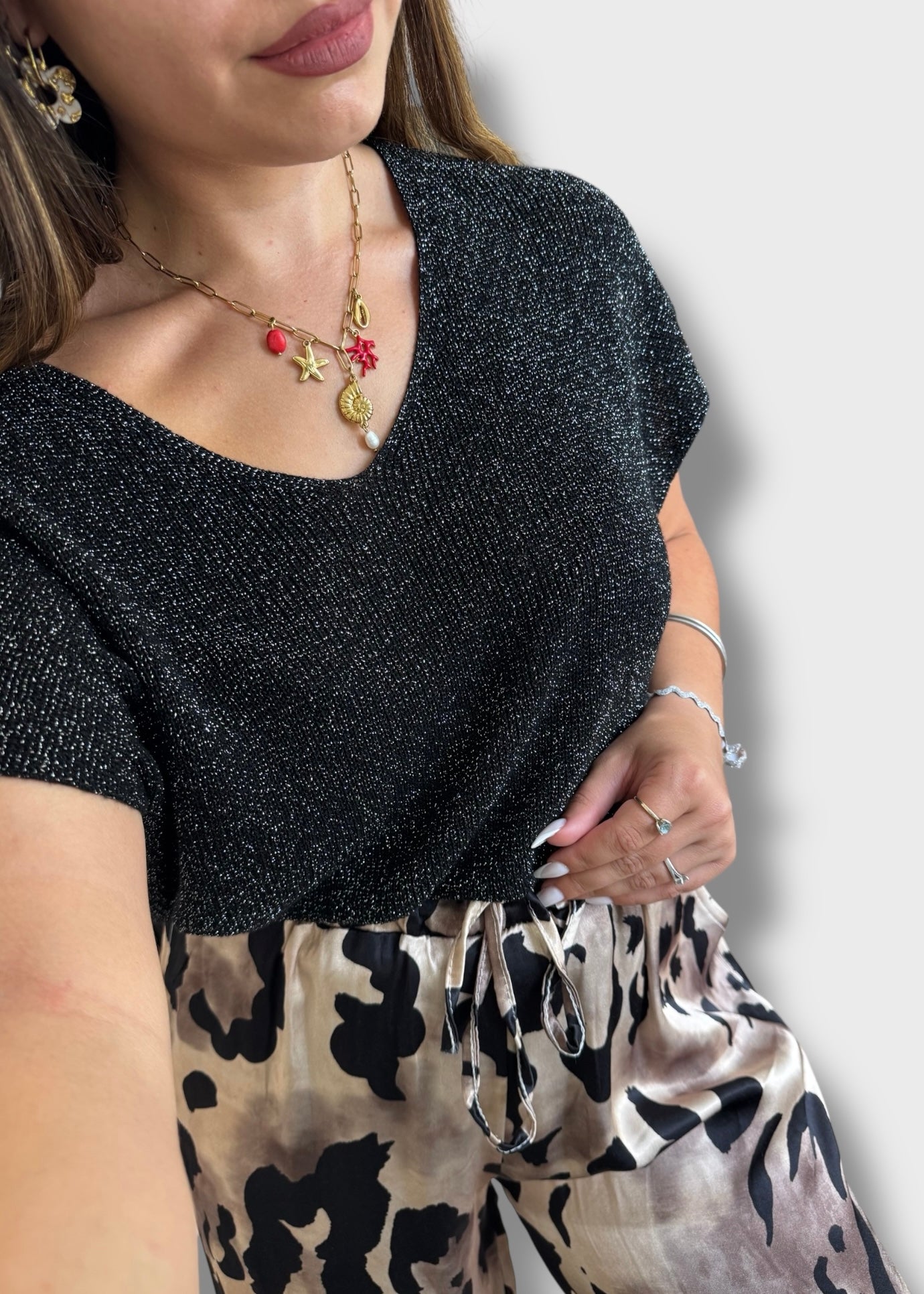 Pull sans manche à paillettes